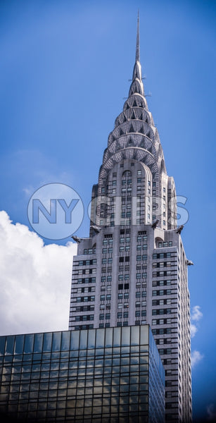 Chrysler Building close-up with bright sunny blue sky day in Midtown Manhattan NYC