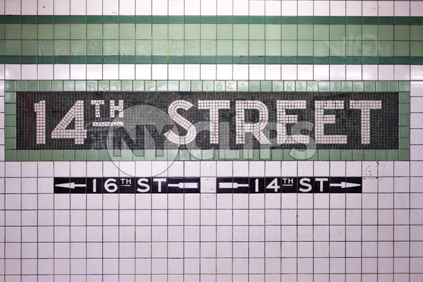 14th street sign on tiled wall in subway station in NYC