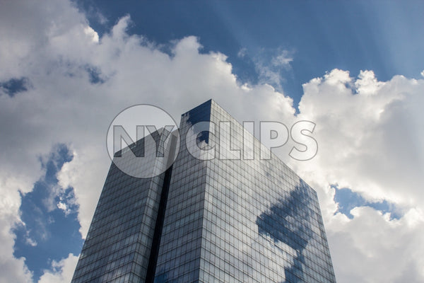 glass condominium in the Bronx on blue sky
