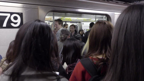 crowded subway platform, passengers entering carriage at rush hour in 4K and 1080 HD in NYC