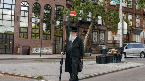 Orthodox Jewish man walking in Williamsburg Brooklyn NYC