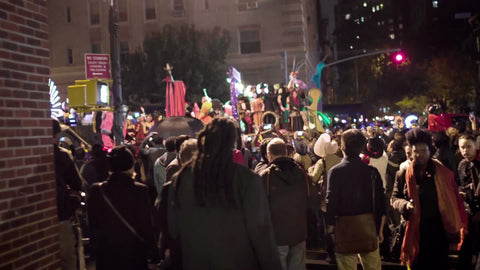Halloween parade float in Greenwich Village - people dressed up in costumes at night