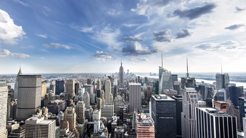 timelapse of Manhattan with Empire State Building - beautiful day to night 4K in New York City