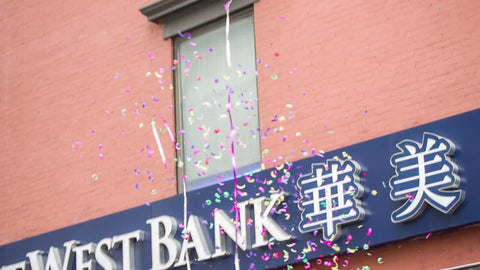 confetti falling to ground on Chinese New Year in Chinatown