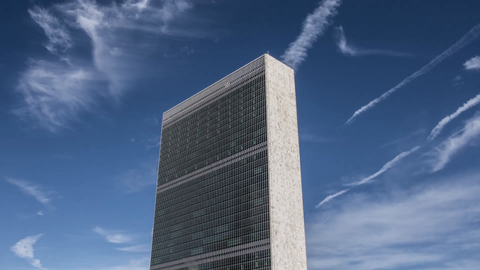 side angle view of isolated UN Building in Manhattan - 4K timelapse