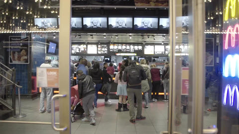people on line at McDonald's - inside 42nd street location off Times Square in Manhattan