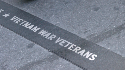 disrespectful people stepping on Vietnam War Veterans plaque on sidewalk - shoes - feet walking past and ignoring heroes - slow motion 4K NYC