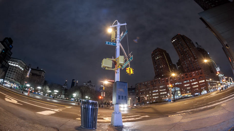 Union Square Park at night - 4K timelapse with taxi cabs and streaks of traffic lights