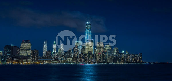 Freedom Tower skyline Downtown Manhattan at night in New York City NYC and East River
