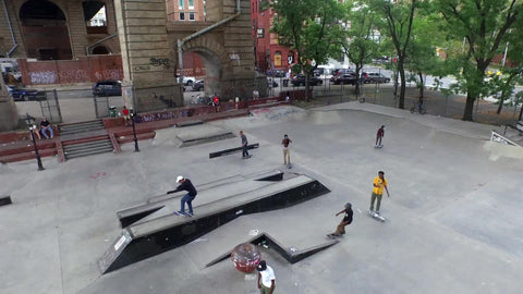 high view of kids skating in park