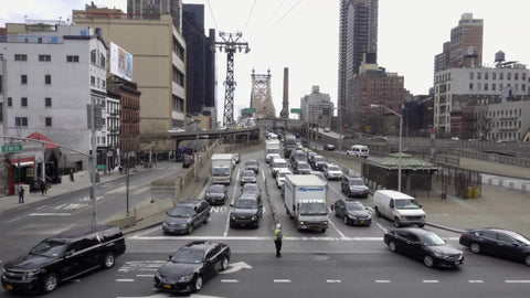 traffic splitting in two lanes - cars exiting Queensboro Bridge with tram overhead in 1080 HD and 4K NYC