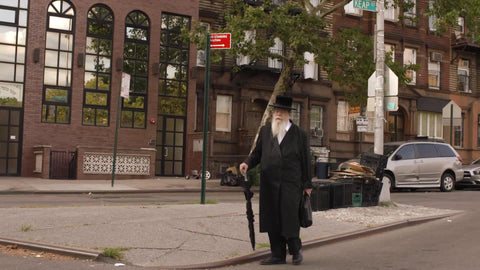 Orthodox Jewish man walking in Williamsburg Brooklyn NYC
