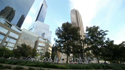 CNN Building and Time Warner Towers in Columbus Circle with fountains in summer