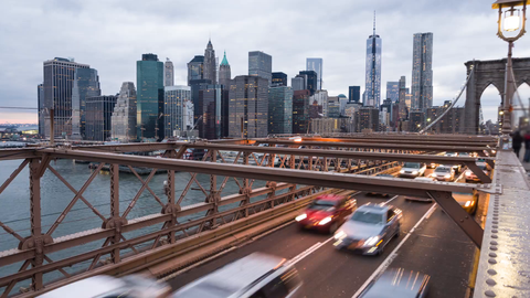 Brooklyn Bridge with Freedom Tower in Manhattan skyline day to night time-lapse in 4K and 1080 HD  NYC