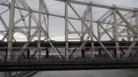 cars crossing Queensboro Bridge in slow motion over the East River - close-up in 1080 HD in New York City