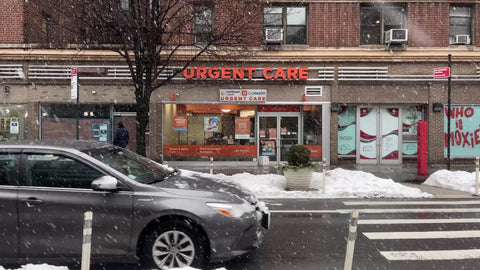 Urgent Care clinic in winter blizzard snow storm snowing in New York City NYC