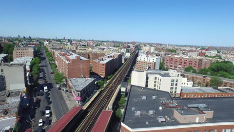 aerial of elevated subway train tracks in the Bronx