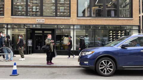 people on line with masks outside Downtown Manhattan New York City NYC