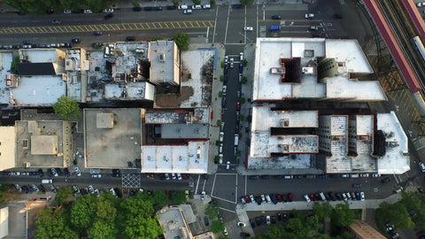 Harlem elevated subway track 1 train - aerial shot moving across