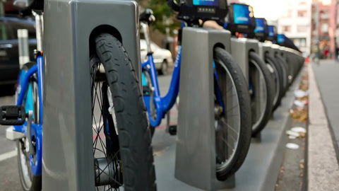 Citi Bikes in a row at station - rising shot