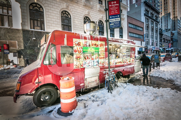 snack truck in Manhattan in winter - snow on ground in street