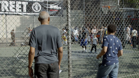 kid scores free-throw shot at warmup practice before basketball game at West 4th Street courts - slow motion 4K in Manhattan NYC