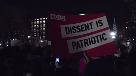 protest Trump in Washington Square Park night - people protesting president in 4K NYC