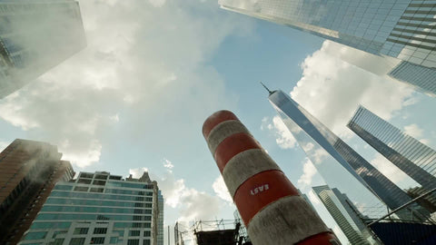 panning shot of Freedom Tower and construction site steam pipe in Downtown Manhattan NYC