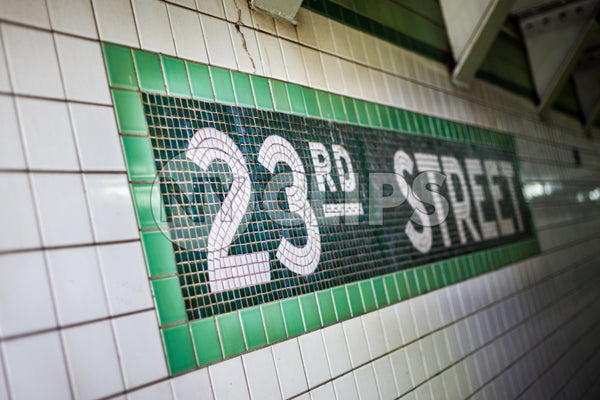 23rd street sign on tile wall in subway station in NYC