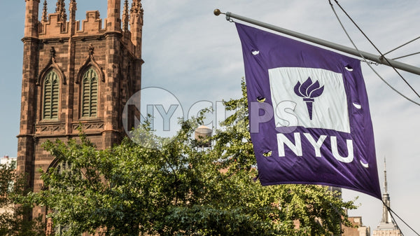 NYU flag and First Presbyterian Church on Lower 5th Ave in Manhattan on summer day