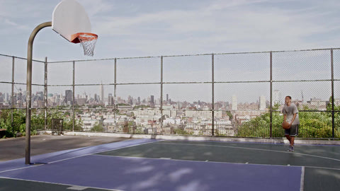 kid shooting and missing, then trying again and scoring - practice makes perfect