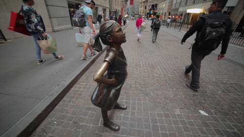 Fearless Girl statue sculpture on Wall Street New York City