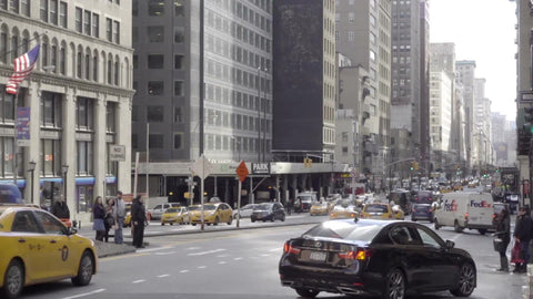 cars driving in traffic on Park Ave during day in winter, 1080 HD in NYC