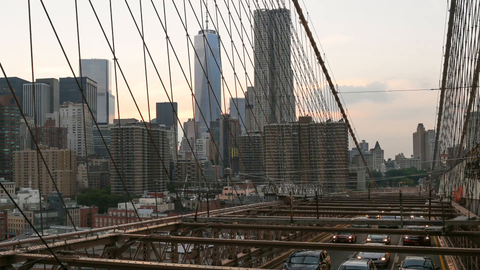 pulling back from Brooklyn Bridge traffic day to night - timelapse in 4K and 1080 HD NYC