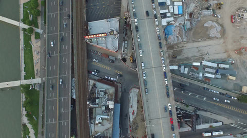 aerial of taxi cab driving on West Side Highway by Hudson River