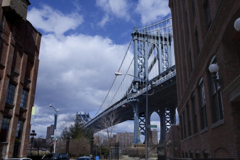 Manhattan Bridge view from Brooklyn street in New York City NYC
