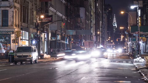 Chrysler Building from Broadway with taxis zooming in SoHo Downtown Manhattan - 4k timelapse NYC
