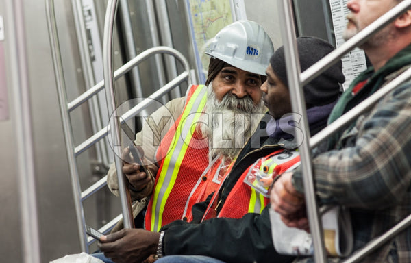 MTA workers on subway - racial and religious harmony on public transportation in NYC