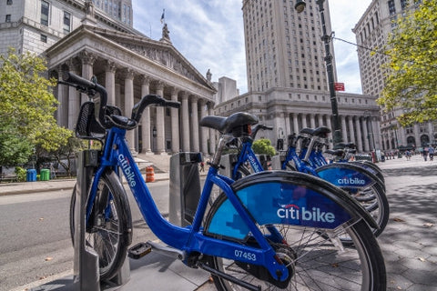 Citi Bikes parked at docking station downtown outside courthouse in Manhattan