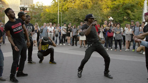 dancers in Washington Square Park summer slow motion New York City 4K