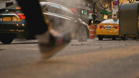feet walking on street with steam from street in winter NYC 4K