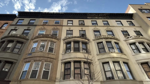 architecture of old brownstone row of buildings townhouses on Upper West Side Manhattan New York City NYC