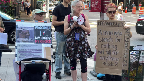 anti-vaxxers with signs and bullhorns in New York City NYC