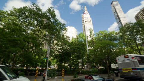 360 degree view of Madison Square Park on 5th Ave with Flatiron Building and skyscrapers in summer