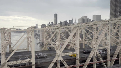 Queensboro Bridge with view of Manhattan skyline, Empire State Building during day in 1080 HD NYC