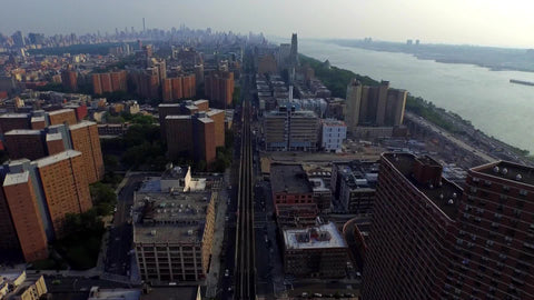 Harlem buildings fast aerial moving - flying over project housing