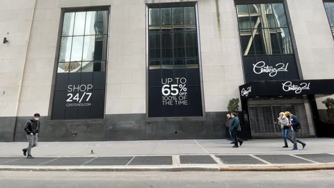 people walking past Century 21 with medical masks in Manhattan New York City NYC