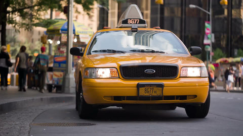 available on-duty taxi cab waiting at taxicab stand in Columbus Circle Manhattan NYC
