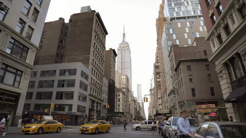 Empire State building Street view from lower Fifth Avenue daytime in 4K and 1080 HD in NYC