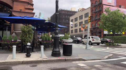Lafayette Grand Cafu00e9 & Bakery outdoor dining blue umbrellas - seating during covid pandemic in Cooper Square Manhattan New York City NYC